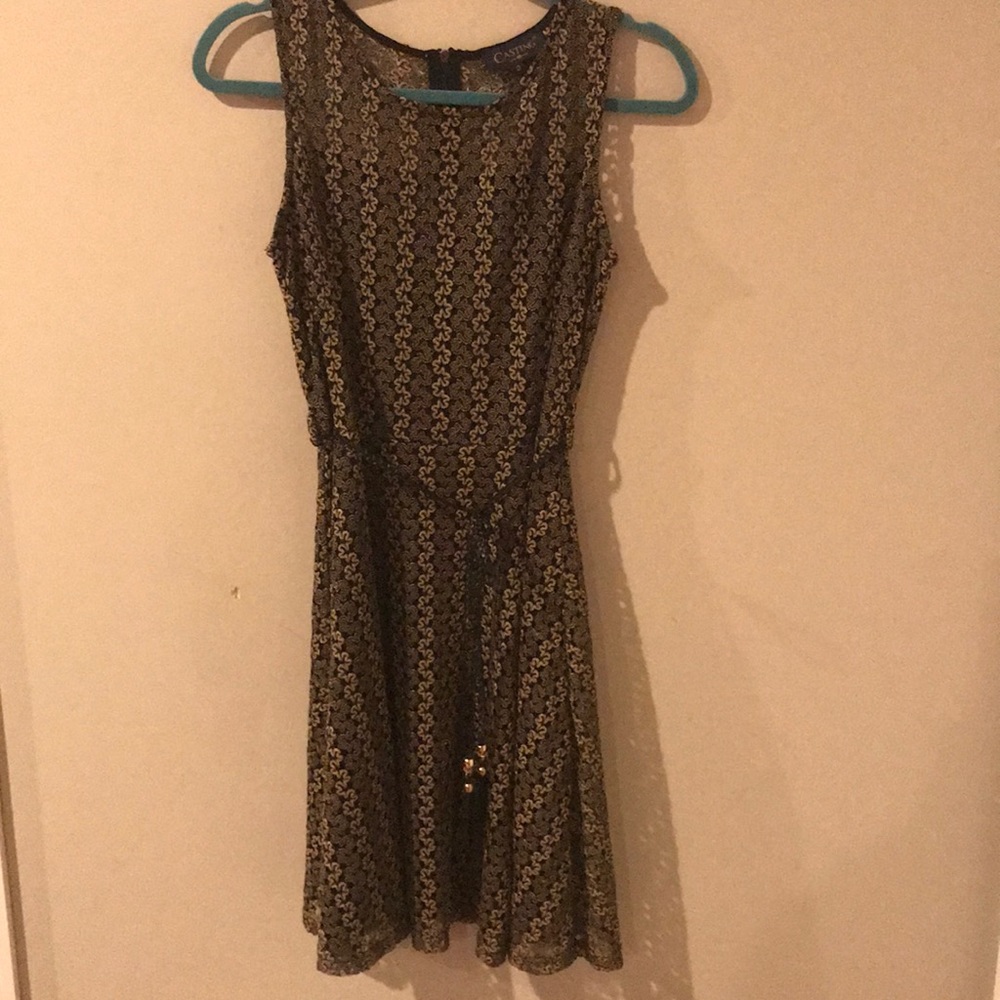 Casting brand dress with hold detailing